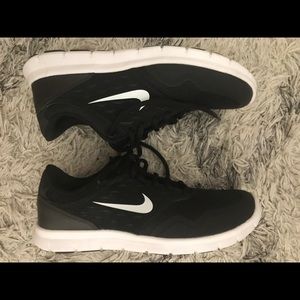 Nike black and white running sneakers size 6.5