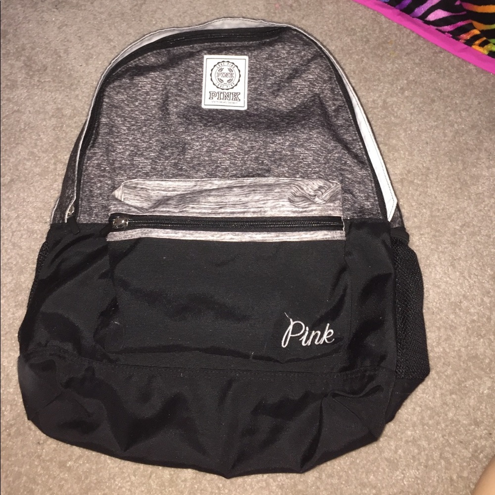 "pink" grey and black backpack