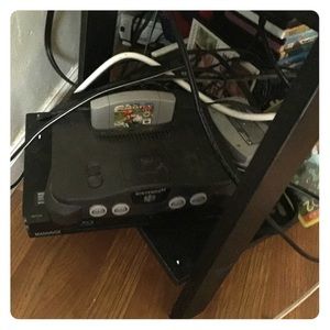 Nintendo 64 it has 4 controllers a few games