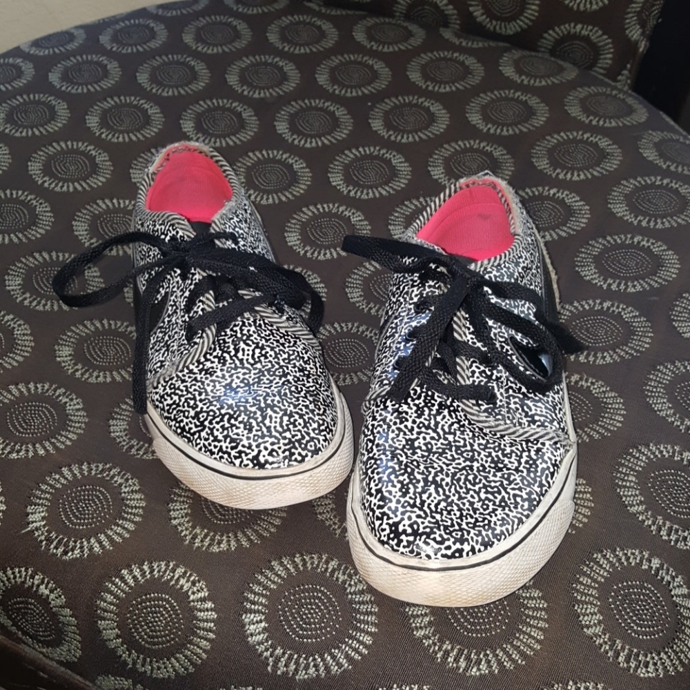 Speckled black and white Nike sneakers