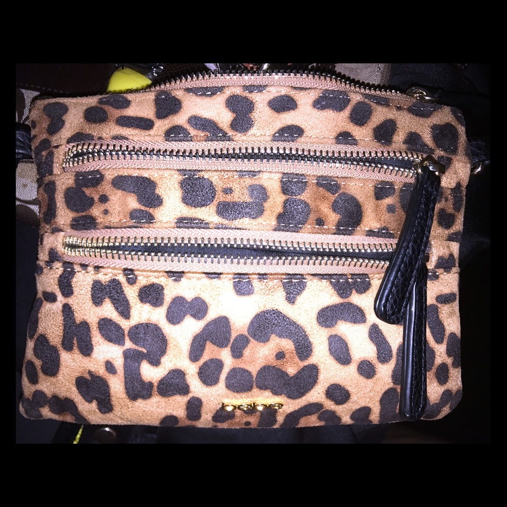 Bebe cheetah print cross-body bag!