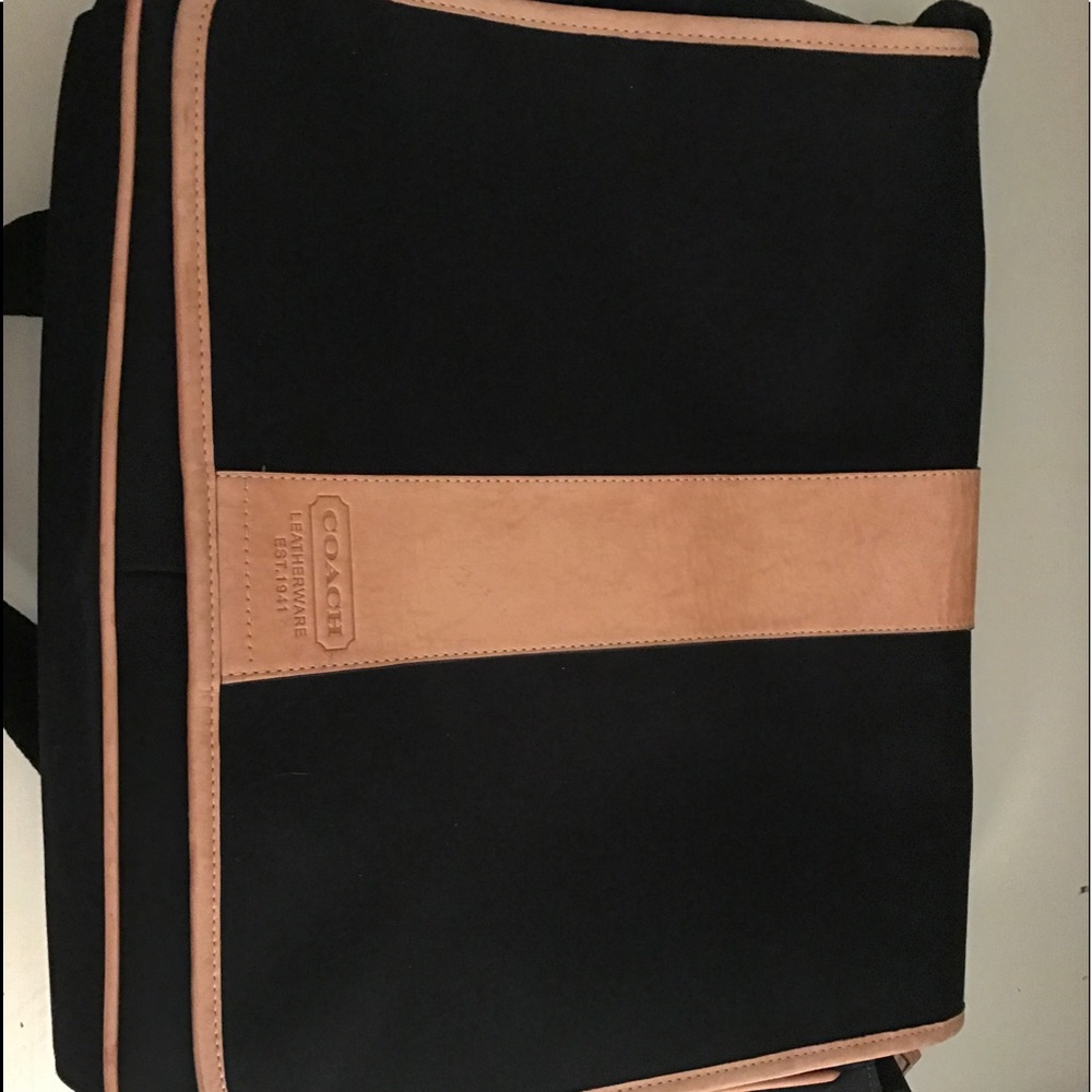 Black and Tan coach messenger bag