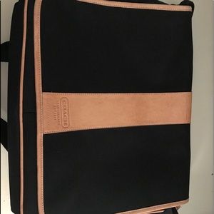 Black and Tan coach messenger bag