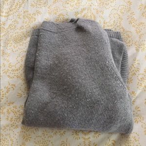 3/4 length sweater with pockets.