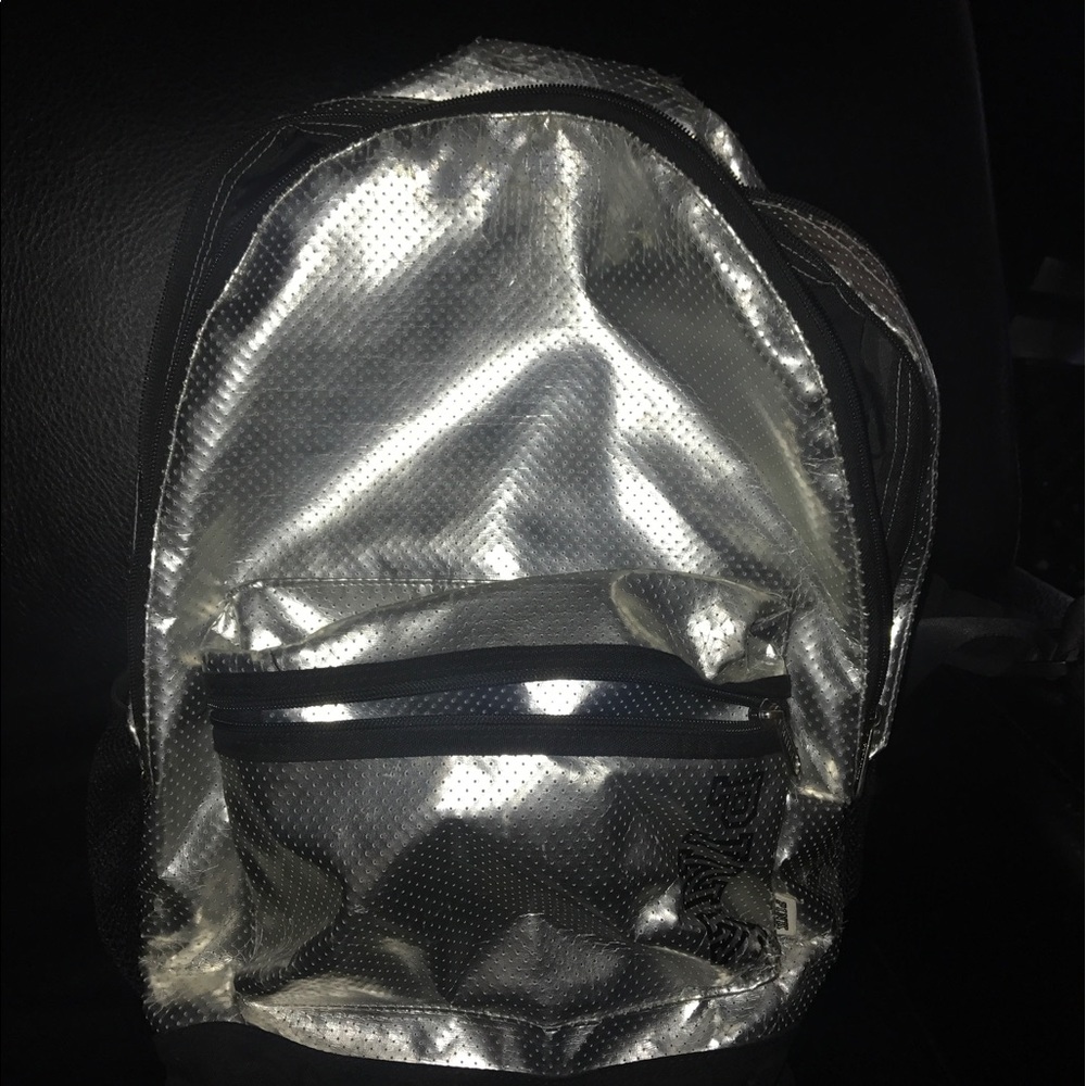 A Victoria secret pink book bag.