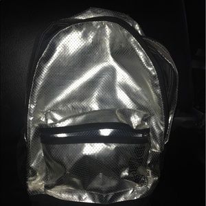 A Victoria secret pink book bag.