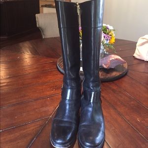 Black leather to the knee boots