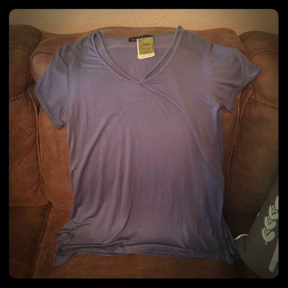 Brand new chic top! Cute neckline! PENDING SALE