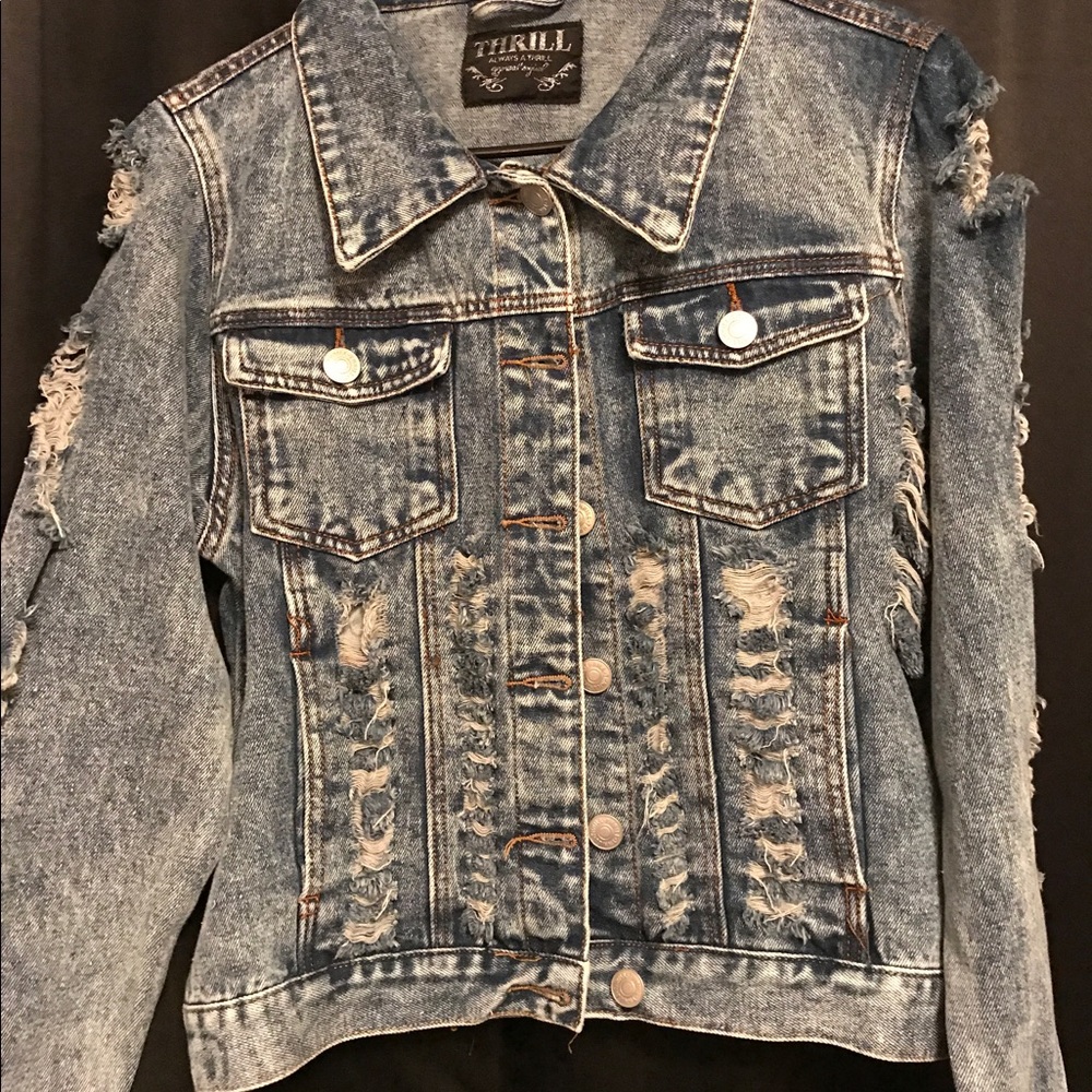Distressed denim jacket