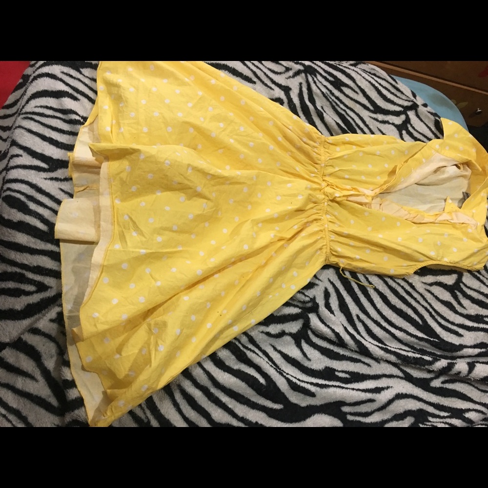 Yellow polka dotted dress