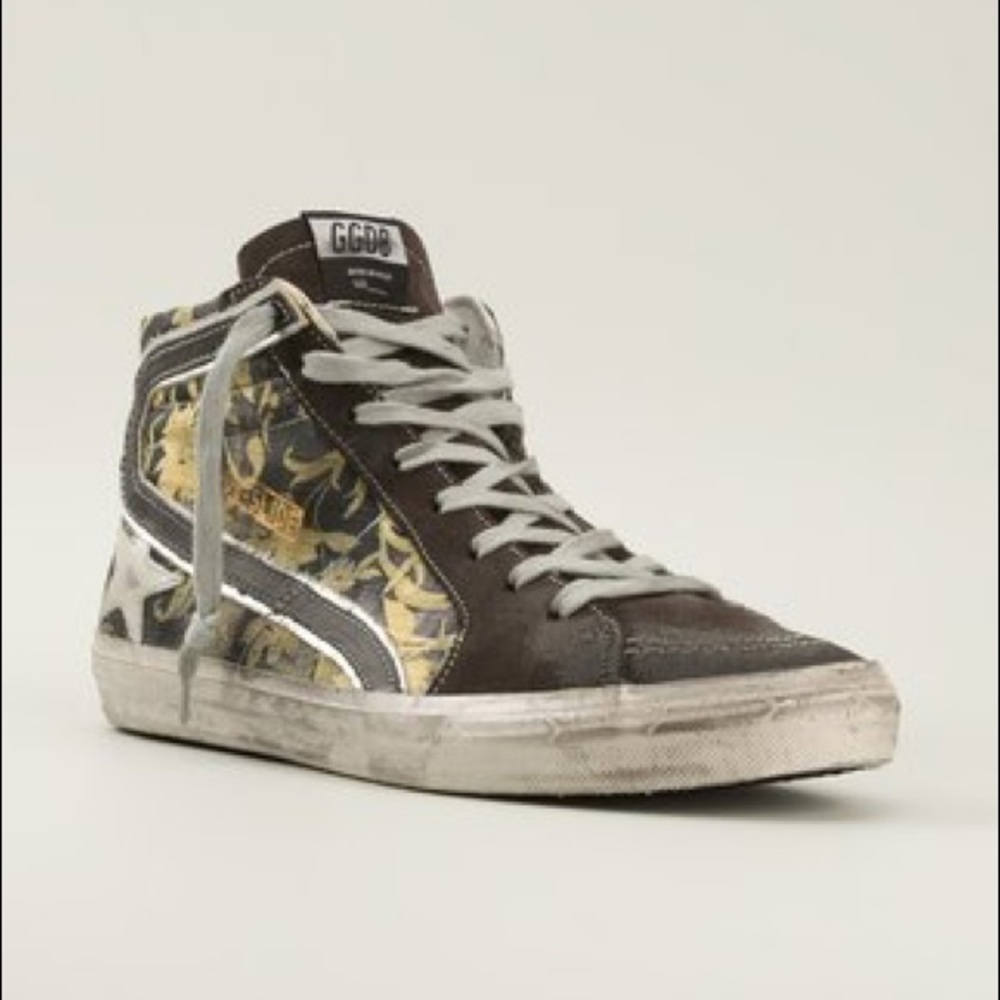 Golden Goose Deluxe Brand high top slide sneakers.