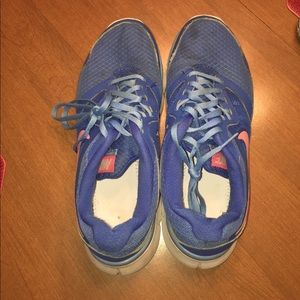 Blue nike shoes.  Inside sole missing