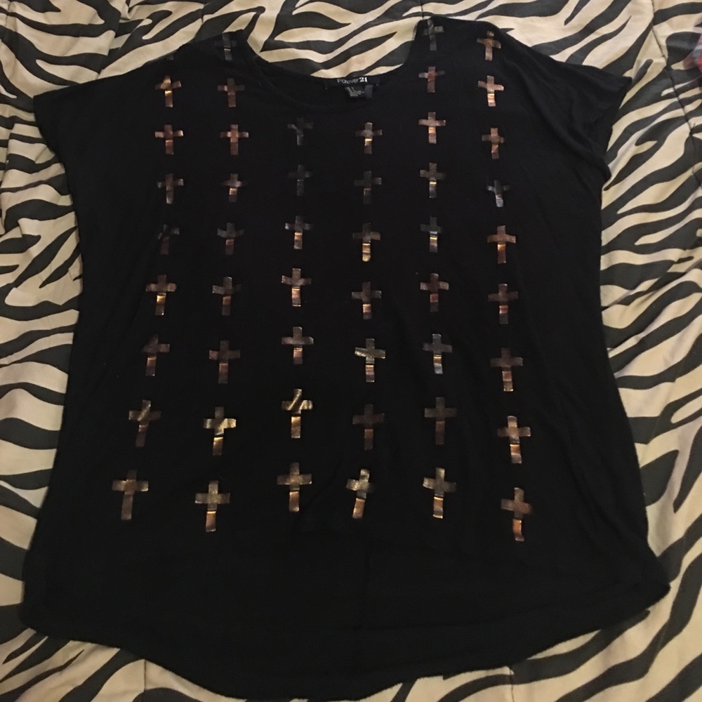 black shirt with gold crosses