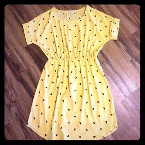 Everly yellow dress with black elephants