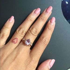 Pear shaped amethyst and diamond rose gold ring