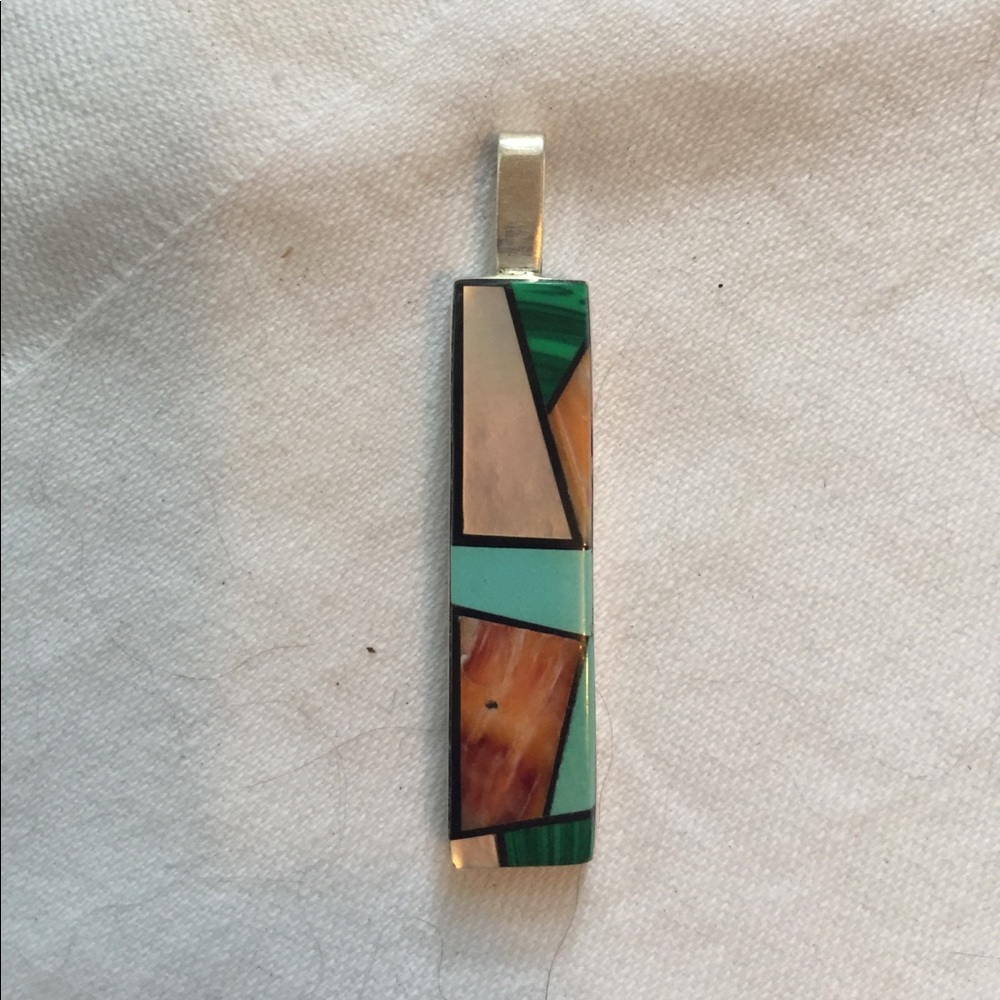 Funky charm, kinda deco.