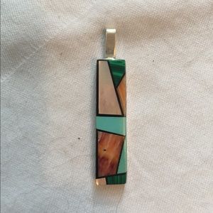 Funky charm, kinda deco.