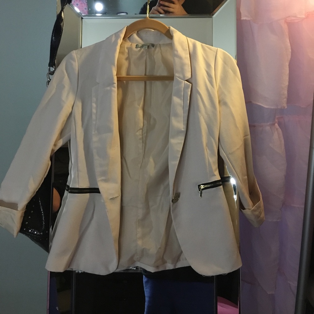 Cream blazer with gold zippers
