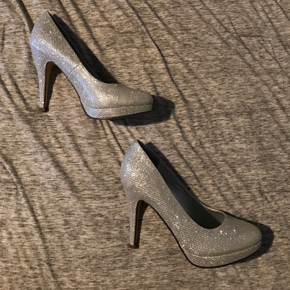 Call it spring silver glitter pumps