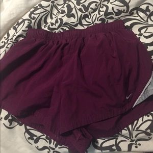 Maroon Nike shorts