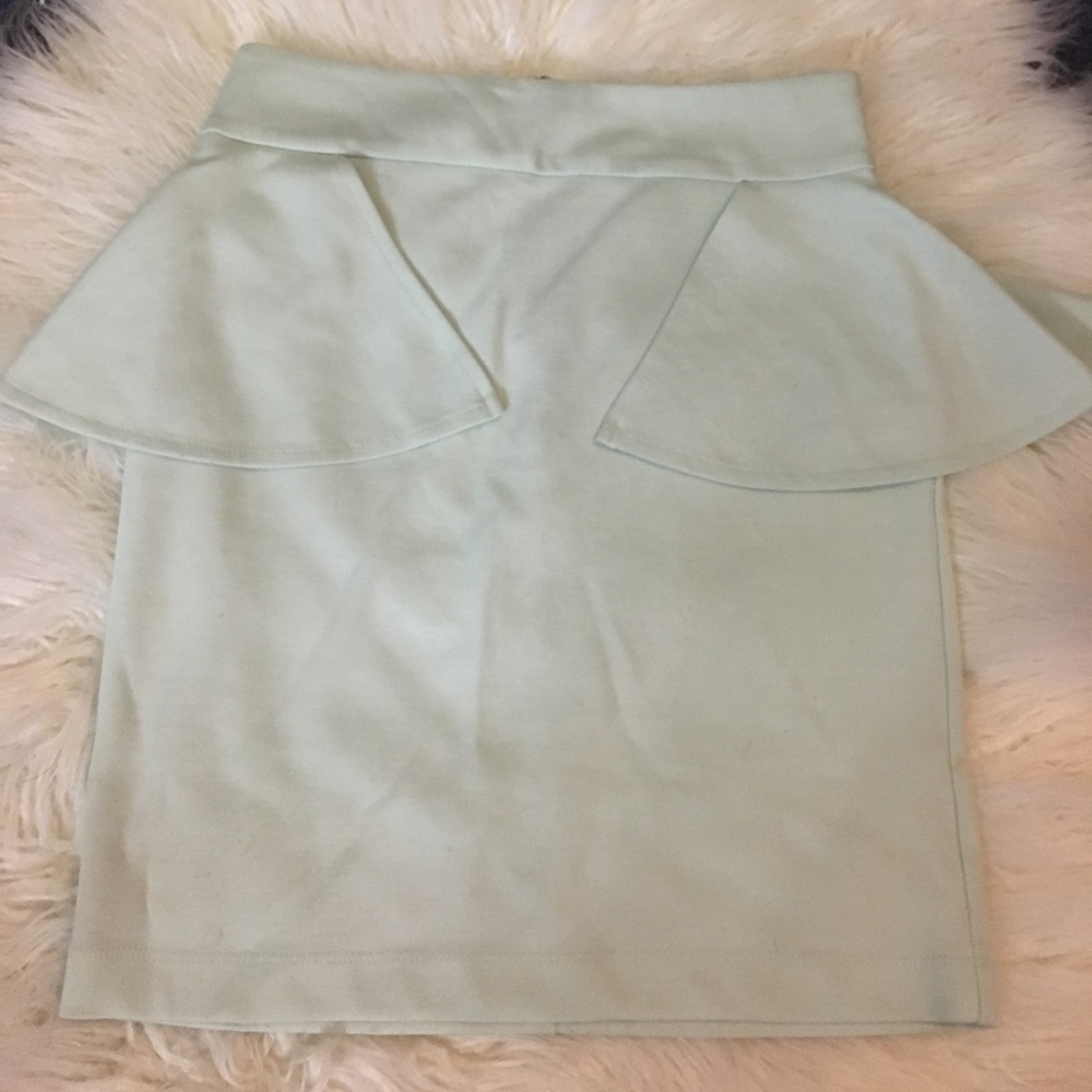 Mint green peplum mini skirt