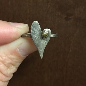 Silver heart ring with baby heart.