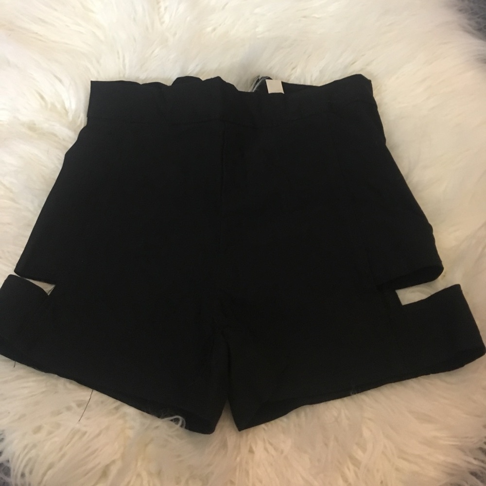 Black cutout mini shorts