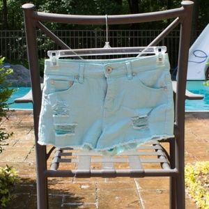 Turquoise stretchy denim jeans