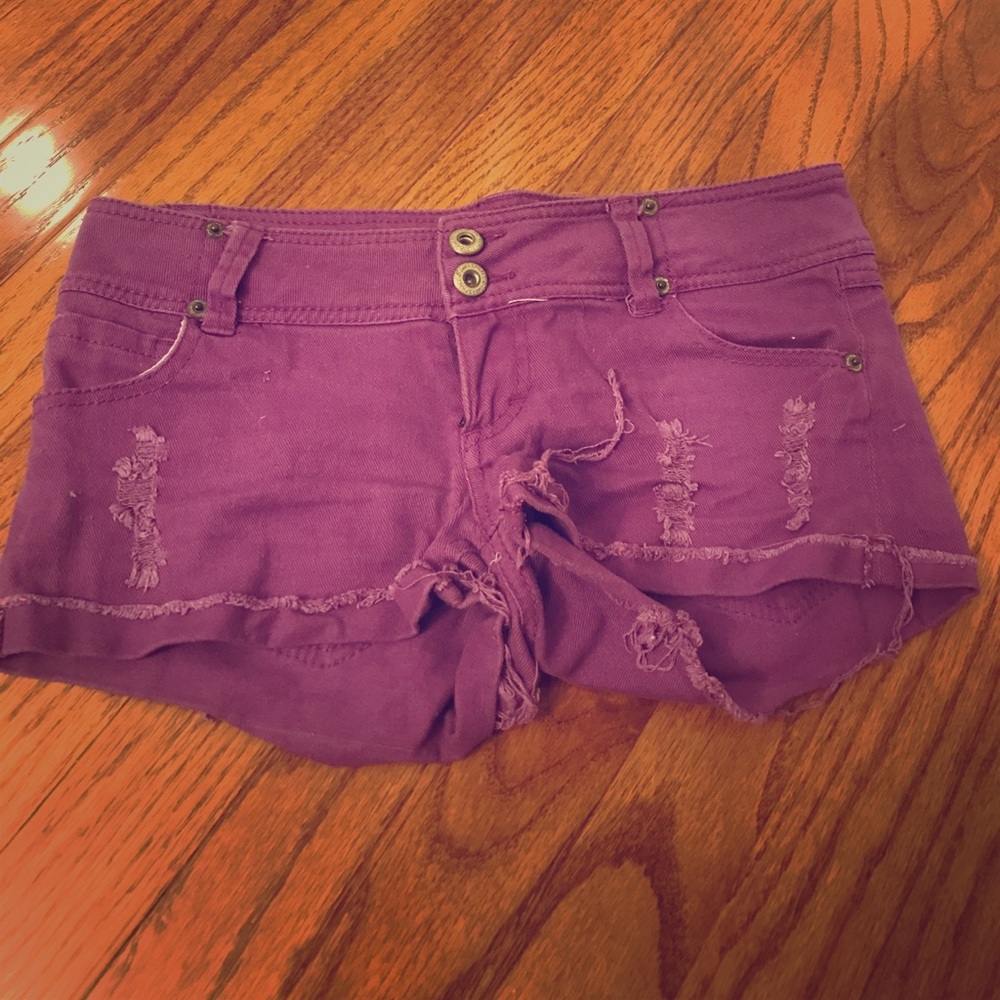 Ripped purple shorts