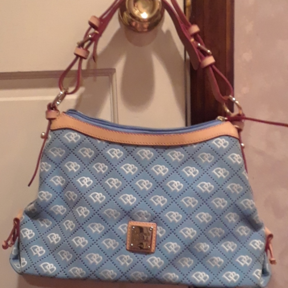 Dooney and Burke  NEVER USED