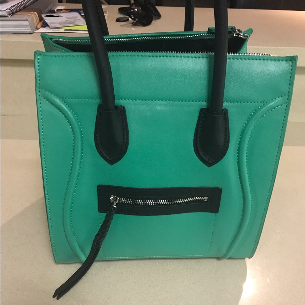 Black and green leather handbag
