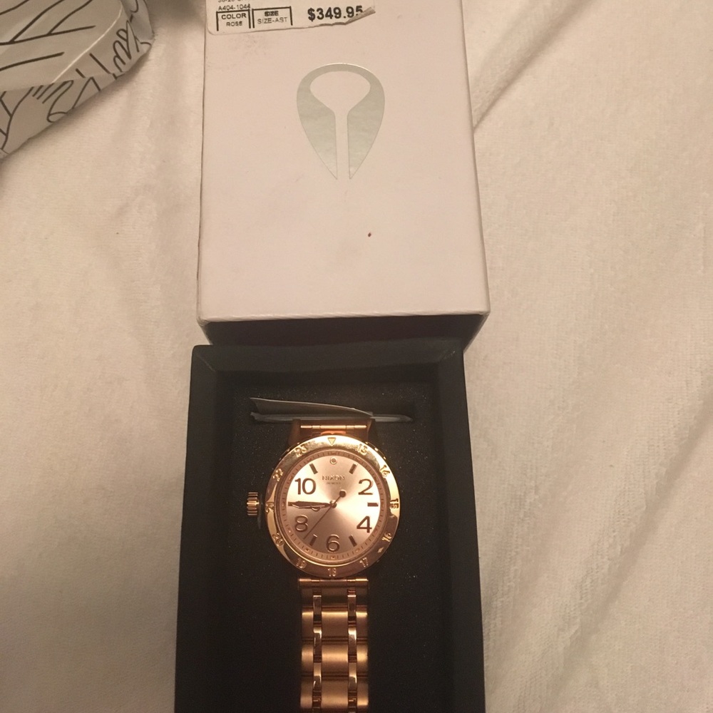Nixon rose gold watch