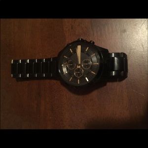 Armani exchange black and gold watch. Never worn!