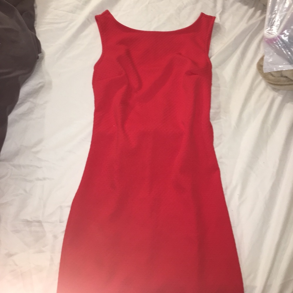 Tight bright red back plunge dress with back bow