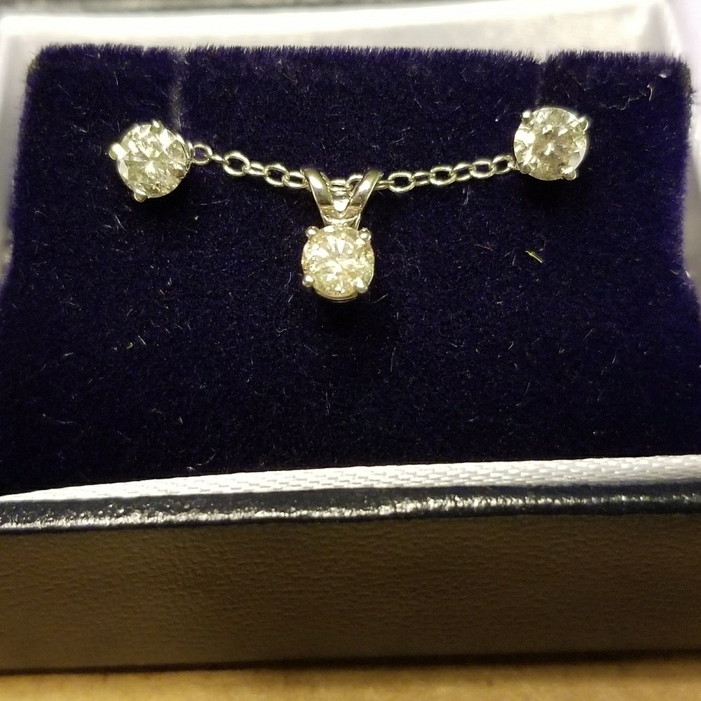 Women's diamond earrings and necklace