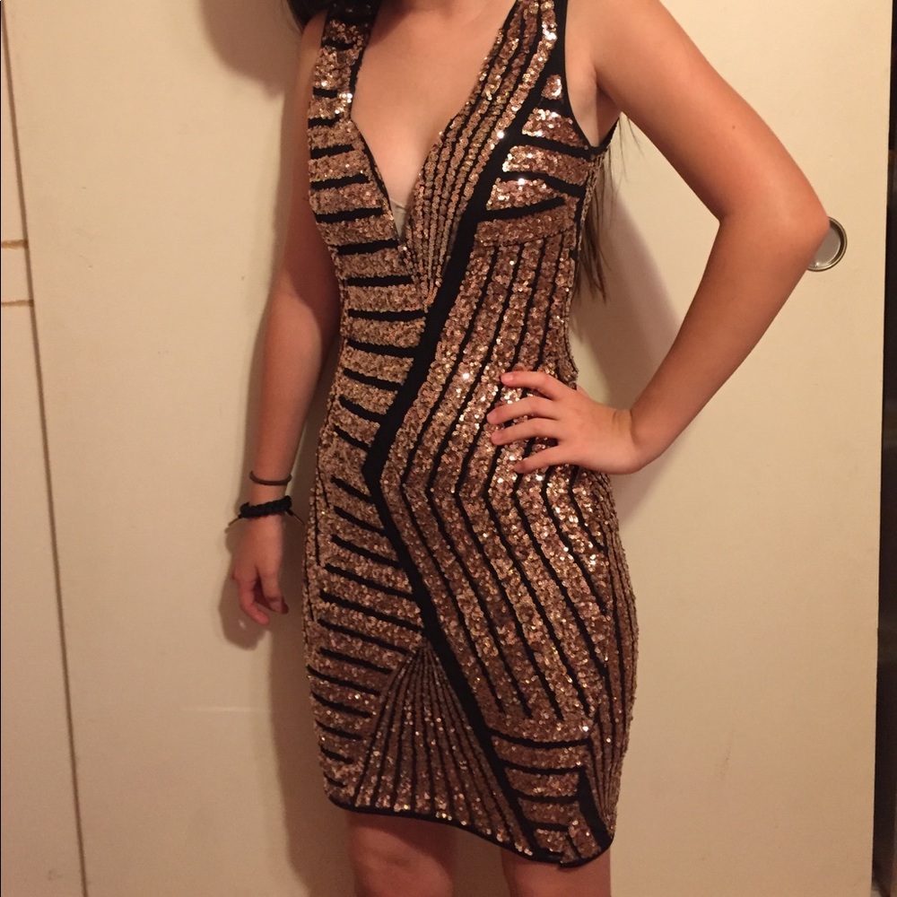 Black and gold sequins dress