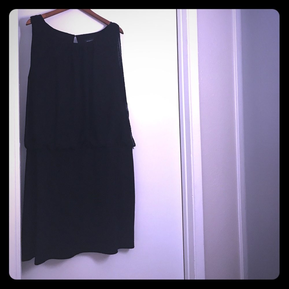 Sleek versatile cocktail or black event knee dress