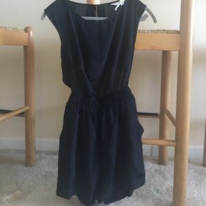 BCBGENERATION black backless romper. Size XS