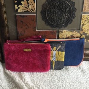 Three cute ipsy bags.