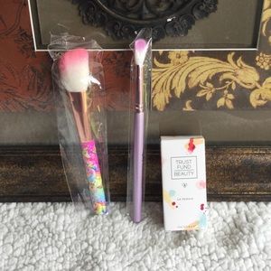 Makeup brushes and nail polish bundle.