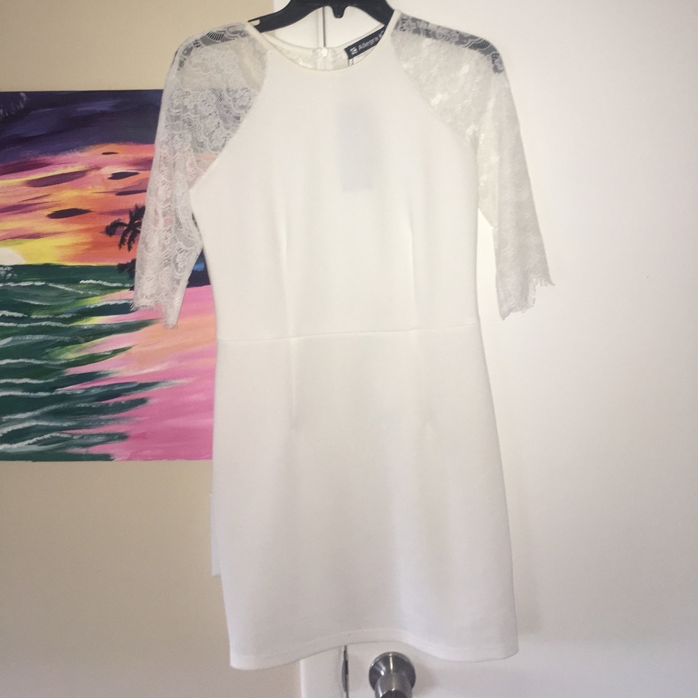 White dress with lace sleeves and lace back