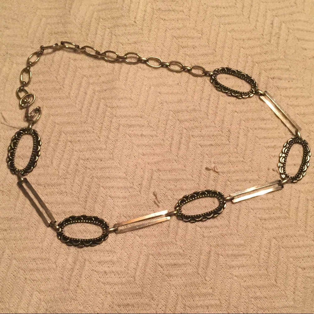 Metal belt with adjusting length