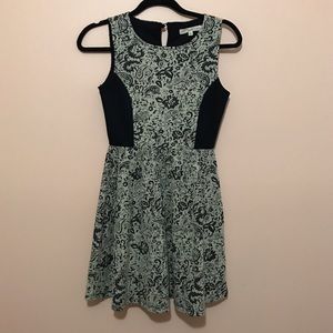 Tan and black sleeveless dress