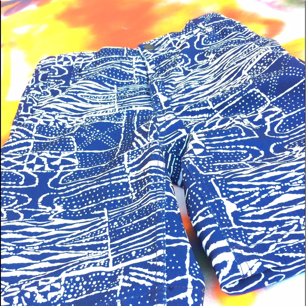 Volcom boy shorts non-stretchy a blue and white.