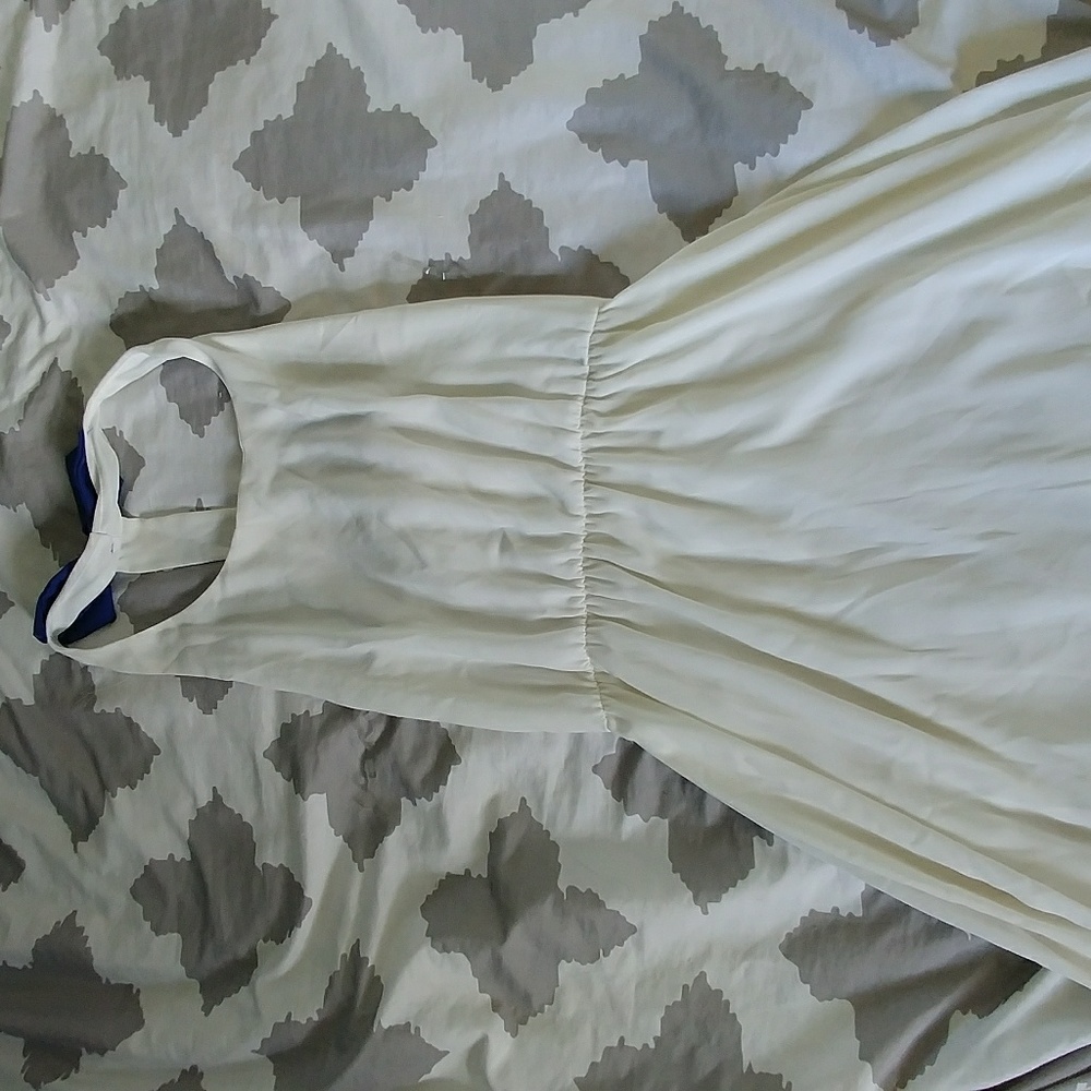 White summer dress with blue bow details