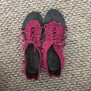 Betsy Johnson fuchsia lace-up ruffle sandals.