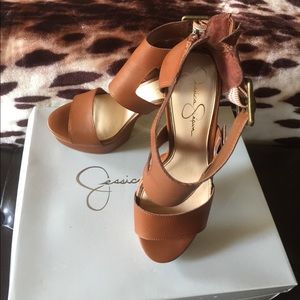 Jessica's brown block heels.