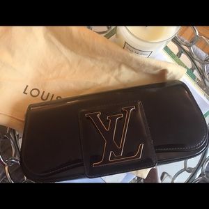100% Authentic Louis Vuitton Sobe Patent Clutch