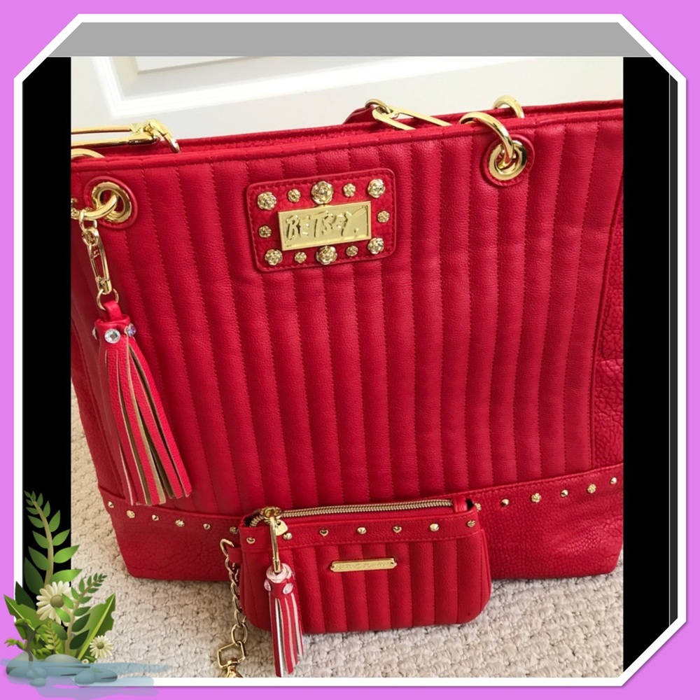 Pre-own Betsey Johnson Tote and wallet set.