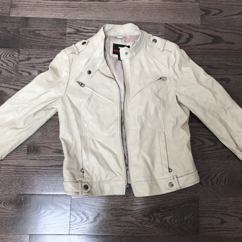 lightly worn faux tan leather jacket